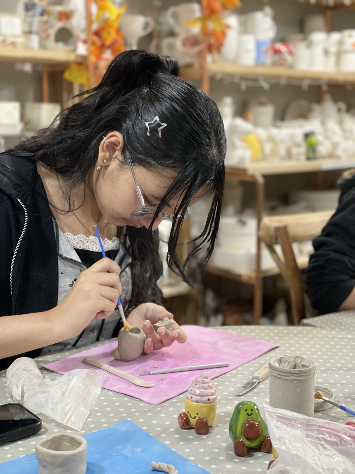 person making mini jellycat figures from clay wick and ceramic ickenham london